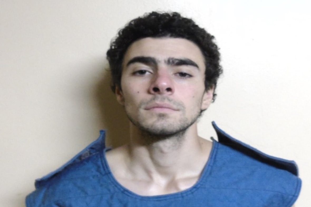 This booking photo shows Luigi Mangione, a suspect in the fatal shooting of UnitedHealthcare CEO Brian Thompson.